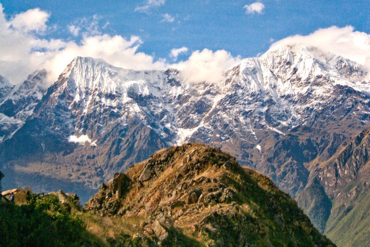 a large mountain in the background